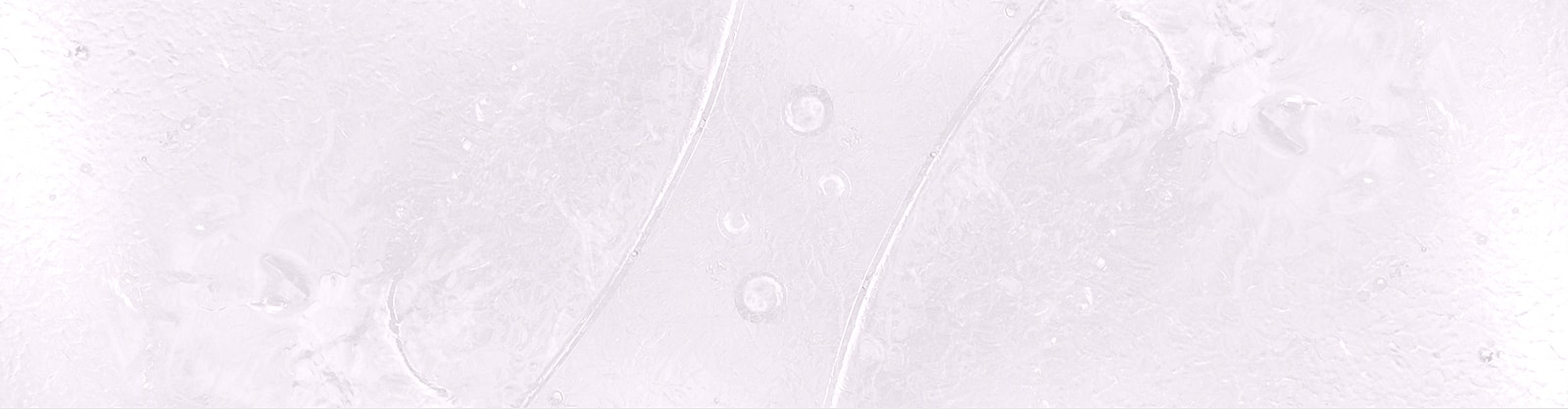 Abstract texture with subtle lines and bubbles.