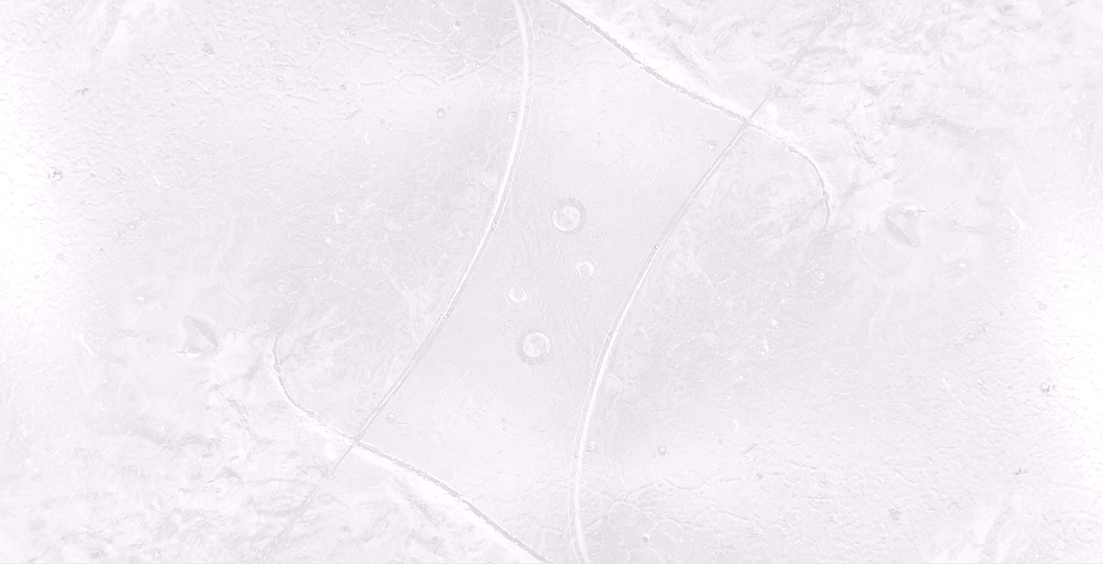 Abstract icy texture with smooth lines and bubbles.